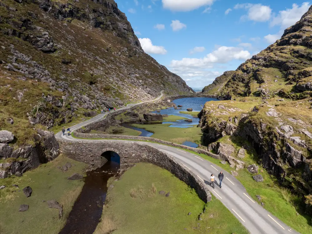 The Gap of Dunloe, with its old stone bridge, lakes and winding road, County Kerry